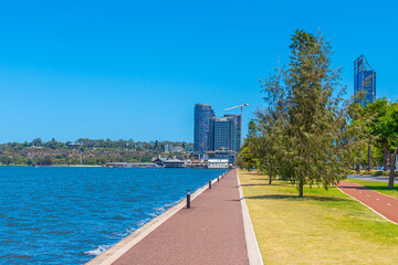 Downtown Perth viewed from riverside promenade of Swan river, Australia © dudlajzov
