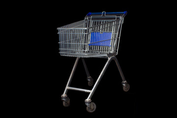 Empty From the supermarket trolley over a plain on a black background.