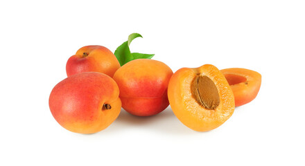 Fresh ripe apricots with leaves, whole fruits and juicy halves with seed isolated on white background    