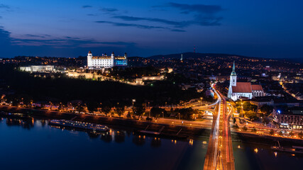 Fototapeta na wymiar Bratislava at night. Castle, river Danube and SNP bridge