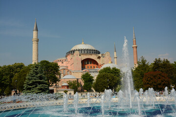 Hagia Sophia with front fountain in sunny day in Istanbul