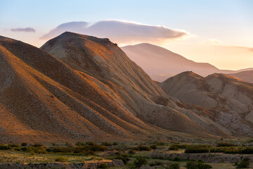 Sunset in the mountains. Red mountains Khizi in Azerbaijan.
