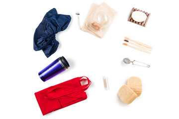 Textile eco bags, glass jars and bamboo toothbrush on white background. Zero waste concept