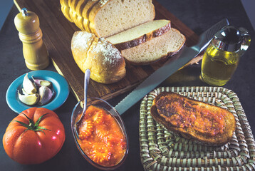 bread with tomato, olive oil, garlic and pepper