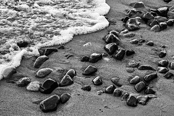 Stones  at sand baltic sea beach in Sopot, Poland
