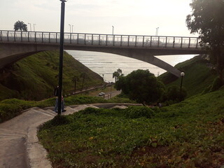bridge over the river at sunset