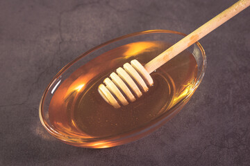 honey pot with wooden spoon 
