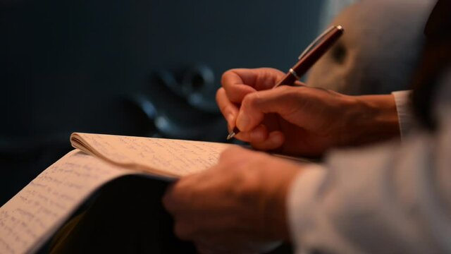 World Press Freedom Day. Woman Journalist Writes Notes With Ink Pen While Interviewing