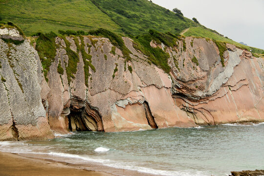 Dragon stone, Itzurun beach, Santa Telma chapel, Zumaia, Basque Country, Atlantic ocean, Spain