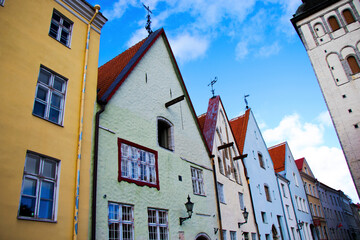Buildings and architecture exterior view in old town of Tallinn, colorful old style houses and street situation.