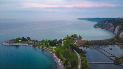 Aerial View of Scarborough Bluffs during Sunrise with island view and calm waters