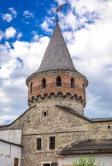 Fototapeta na wymiar Castle with Lanckoronska Tower in historic part of Kamianets Podilskyi city, Ukraine
