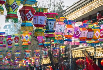 Decorations after New Year celebration in Liulichang hutong, famous shopping area near Qianmen Street in Beijing city, China