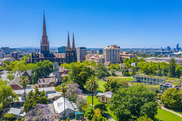 Saint Patrick cathedral viewed behind parliament gardens in Melbourne, Australia