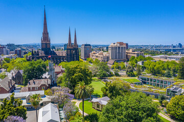 Saint Patrick cathedral viewed behind parliament gardens in Melbourne, Australia