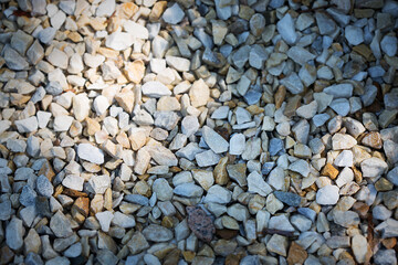 pebble gravel background with abstract shadow