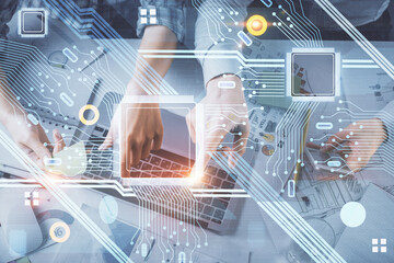 Double exposure of man and woman working together and data theme hologram drawing. Computer background. Top View.