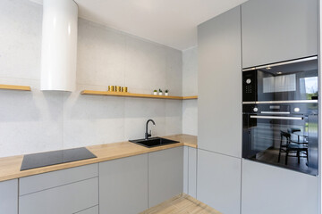 Fototapeta na wymiar clean bright modern minimalist style kitchen