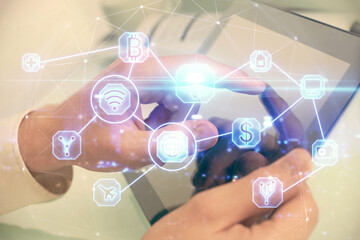 Double exposure of man's hands holding and using a phone and social network theme drawing.