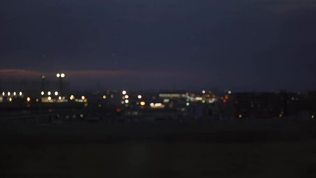 Bokeh lights and purple sunset sky ambient from the train window (120fps conformed to 60fps)