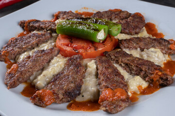 Turkish and Arabic Ali Nazik Kebab, mince with aubergine yogurt paste 
