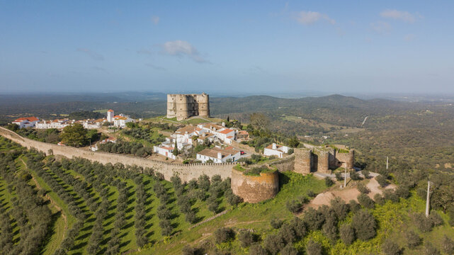 Medieval city of Evoramonte - Portugal. Aerial view of the fortified city with olive plantations around in the Alentejo region in Portugal