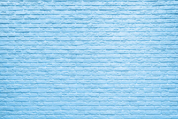 Blue brick wall background inside of the room.
