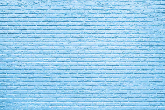Blue brick wall background inside of the room.