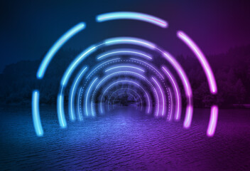 On the lake, a channel space constructed by glowing neon light lines.
