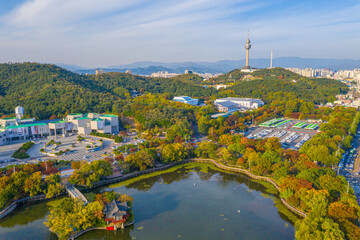Aerial view of 83 Tower behind an artificial lake in Daegu, Republic of Korea