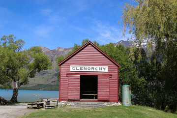 Fototapeta na wymiar The iconic red shed at Glenorchy lake Wakatipu New Zealand near Queenstown 