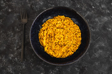 plant-based food, vegan fried brown rice with turmeric lentils and onions
