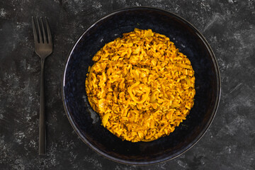 plant-based food, vegan fried brown rice with turmeric lentils and onions