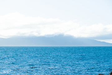 Calm mediterranean sea Ocean And Blue Sky Background waves soft surface, abstract background pattern
