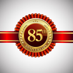 Celebrating 85th anniversary logo, with golden badge and red ribbon isolated on white background.