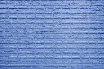 Blue brick wall background inside of the room.