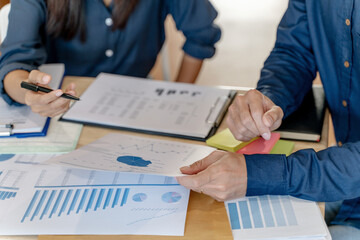 Business financial team meeting discussing performance in sales.