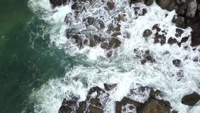 Waves Crashing on Rocks Drone Top View