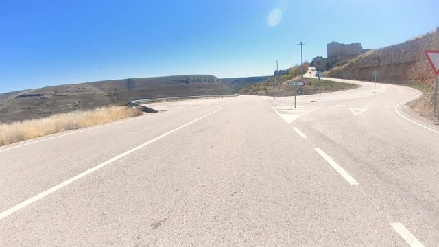 SO-132 paved road passing beside Rello village, province of Soria, Castilla y Leon, Spain
