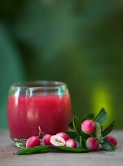 The red juice of ancient Thailand name carunda or karonda (Carissa Carandas L.), Thai herb juice.