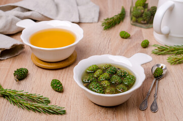 Green cones in yellow syrup