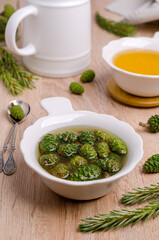 Green cones in yellow syrup