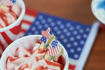 Celebrating Fourth of July. Happy Independence day. Sweets decorated in traditional colors and American national flag
