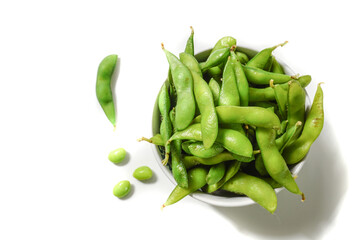 green soybeans on white background