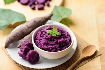 Mashed purple sweet potatoes in a bowl, Healthy food