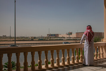 image from back of Saudi businessman,