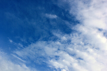 beautiful photos of the blue sky on a clear day with clean white clouds, a combination of blue and white and sparkling sunlight add a sense of enthusiasm for outdoor activities