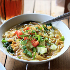 Mie Godog Jawa or Mie Nyemek is One of Popular Street Food from Gunung Kidul Central Java. Made from Noodle and Vegetable, Served with Spring Onion and Fried Shallots. Fresh and Delicious. 