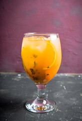 Orange cocktail on rustic background. Selective focus. Shallow depth of field.
