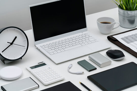 Flat lay of office desktop and gadgets